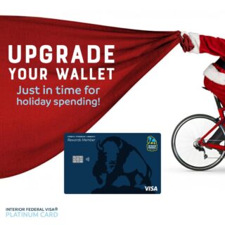 Santa pulling his sack on a bike | Upgrade Your Wallet